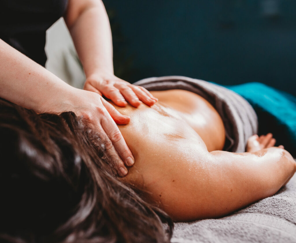 A woman getting a back massage