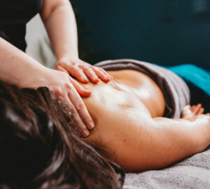 A woman getting a back massage