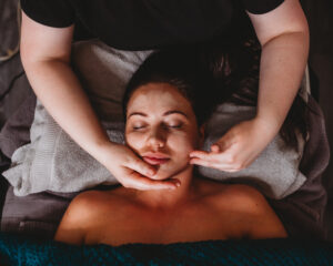 Woman getting a facial massage