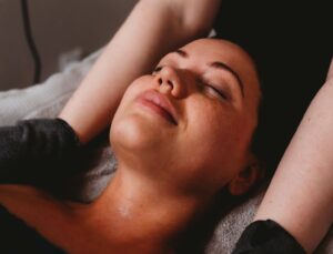 A woman getting beauty treatment at a spa